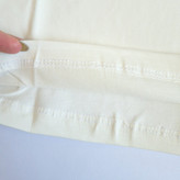 تاپ رکابی نخی بچگانه دخترانه رنگ شیری روشن با پاپیون فانتزی ظریف مناسب سن ۳ تا ۱۲ سال مدل تابستانه خنک